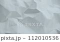 Crumpled sheet of paper. Live wallpaper abstract background. Slow motion. Place for text, title. Can use in vertical position 112010536