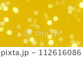 Defocused bokeh particles light on gold background 4K loop 112616086
