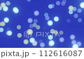 Defocused bokeh particle light on blue background 4K loop 112616087