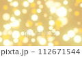 Bokeh particles light on gold background 4K loop 112671544