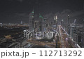 Drone flight over the night city of Dubai LOG 112713292