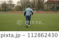 Old man paying sport game at the stadium. Healthy lifestyle. 112862430