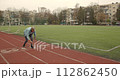 Active healthy sporty lifestyle. Senior woman doing sports at stadium. 112862450