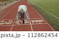 Active healthy sporty lifestyle. Senior woman doing sports at stadium. 112862454