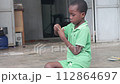 Little boy having fun with rubber ropes. Little boy having fun with rubber ropes. 112864697