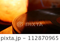 Spinning vinyl record close-up. Record tracks in shallow depth of field. 112870965