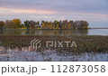 fall dusk scenery in Boyd Lake State Park in Loveland, Colorado, with a light breeze 112873058