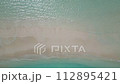 stunning blue ocean and sandy white island maldives top drone aeral view deserted hidden beach copyspace for text 112895421