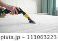The concept of cleaning and housekeeping. Dry cleaning of the mattress by a professional method 113063223