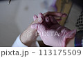 Shaping the nail with a file during a manicure 113175509