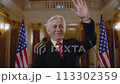 New President of the United States smiles and gestures during press campaign 113302359