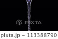 Water flowing from a narrow spot such as a faucet 113388790
