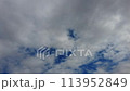 Time lapse of blue sky covered by thick clouds 113952849