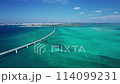 Drone shot of the Irabu Bridge connecting Miyako Island and Irabu Island and the blue sea ② 114099231