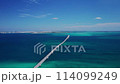 Drone shot of the Irabu Bridge connecting Miyako Island and Irabu Island and the blue sea⑪ 114099249