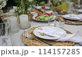 beautiful wedding table with food and drinks for an outdoor banquet in the park	 114157285