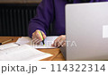 Study session student with laptop and papers yellow marker for highlighting pertinent details. Practice of highlighting actively engage with material reinforcing their understanding Highlighting text. 114322314