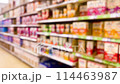 Blurred supermarket aisles with various products on display, store interior as background. High quality 4k footage 114463987