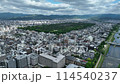 Drone shot of the Kamo River flowing through the center of Kyoto City 114540237