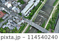 Drone shot of the Kamo River flowing through the center of Kyoto City 114540240