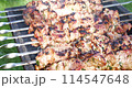 outdoor barbecue, cooking meat on the grill 114547648