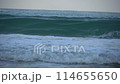 Waves of Mediterranean Sea rolling in to the sandy beach.  114655650