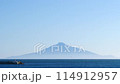 Rishiri Island appears to be floating with clouds hanging over the foot of the mountain. An island in the sky. 114912957