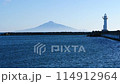 Clear blue sky, view of the lighthouse and Rishiri Island. (Copy space) 114912964