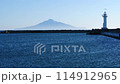 Clear blue sky, view of the lighthouse and Rishiri Island. (Copy space) 114912965