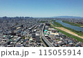 Aerial footage of Moriguchi City, Asahi Ward, and Higashiyodogawa Ward in Osaka Prefecture overlooking the Yodo River 115055914