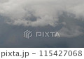 Clouds drifting in the sky during unstable weather 115427068