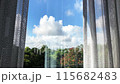 By the window. 115682483