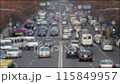 Busy city street with cars and people. Blurred background video 115849957