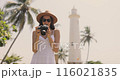 Female Photographer Capturing Galle Fort Lighthouse in Sri Lanka 116021835
