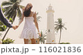 Couple Holding Hands at Galle Fort Lighthouse in Sri Lanka 116021836