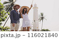 Couple Taking Selfie with Smartphone at Galle Fort Lighthouse in Sri Lanka 116021840