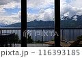 Relaxation in the beauty of a lakeside view with hills from the serene balcony 116393185