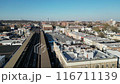 A city view with a train running through it 116711139
