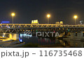 The scyscrapers of the Moscow City at night and the Dorogomilovsky bridge with illumination. Moscow, Russia - urban background. Translation of text - street names: Krasnopresnenskaya, center, etc. 116735468