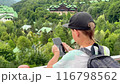 boy making videocall on background of beautiful caucasus mountains 116798562