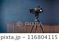 Professional camera on a tripod 116804115