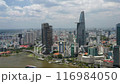 Ho Chi Minh city aerial cityscape view with tall buildings and riverbank  116984050