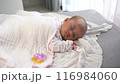 Footage of adorable baby sleeping with pacifier by her side 116984060