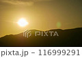 Timelapse. Golden sunset over the mountain. 116999291
