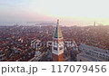 Stunning Aerial View of Venice Iconic Bell Tower and Serene Lagoon Captured at Sunset 117079456