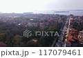 Aerial View of a Beautiful Coastal Neighborhood Surrounded by Lush Greenery and Bay 117079461