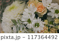 beautiful bouquet consisting of chrysanthemum flowers, roses and daisies 117364492