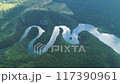 aerial view of a picturesque river meandering among the hills 117390961