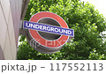 Underground sign in London at entrance of metro tube station 117552113