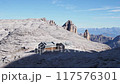 Dolomites, Italian Alps. In the background the rifugio Boe hut in the background. Hiking trip to Piz Boe. Sella massif 117576301
